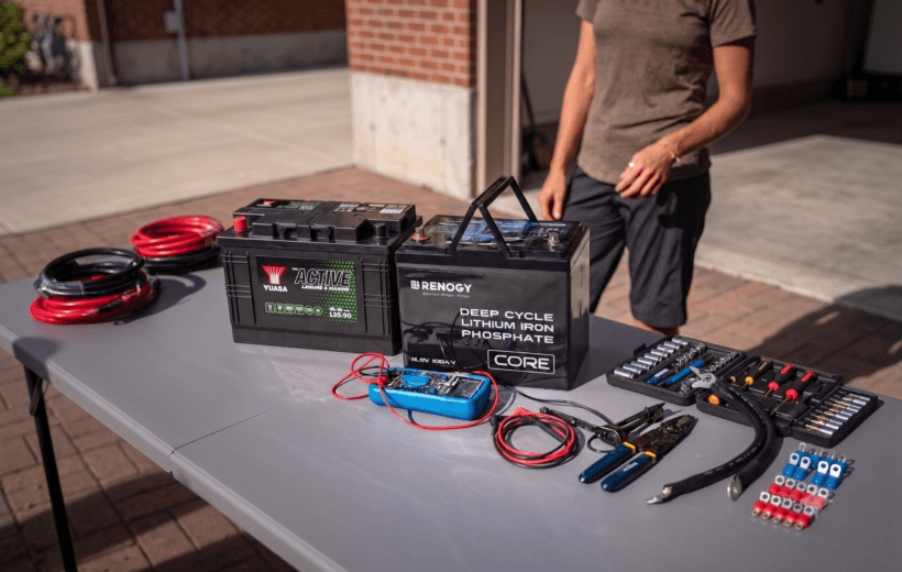 Image of a work table with a lithium battery and a leisure battery